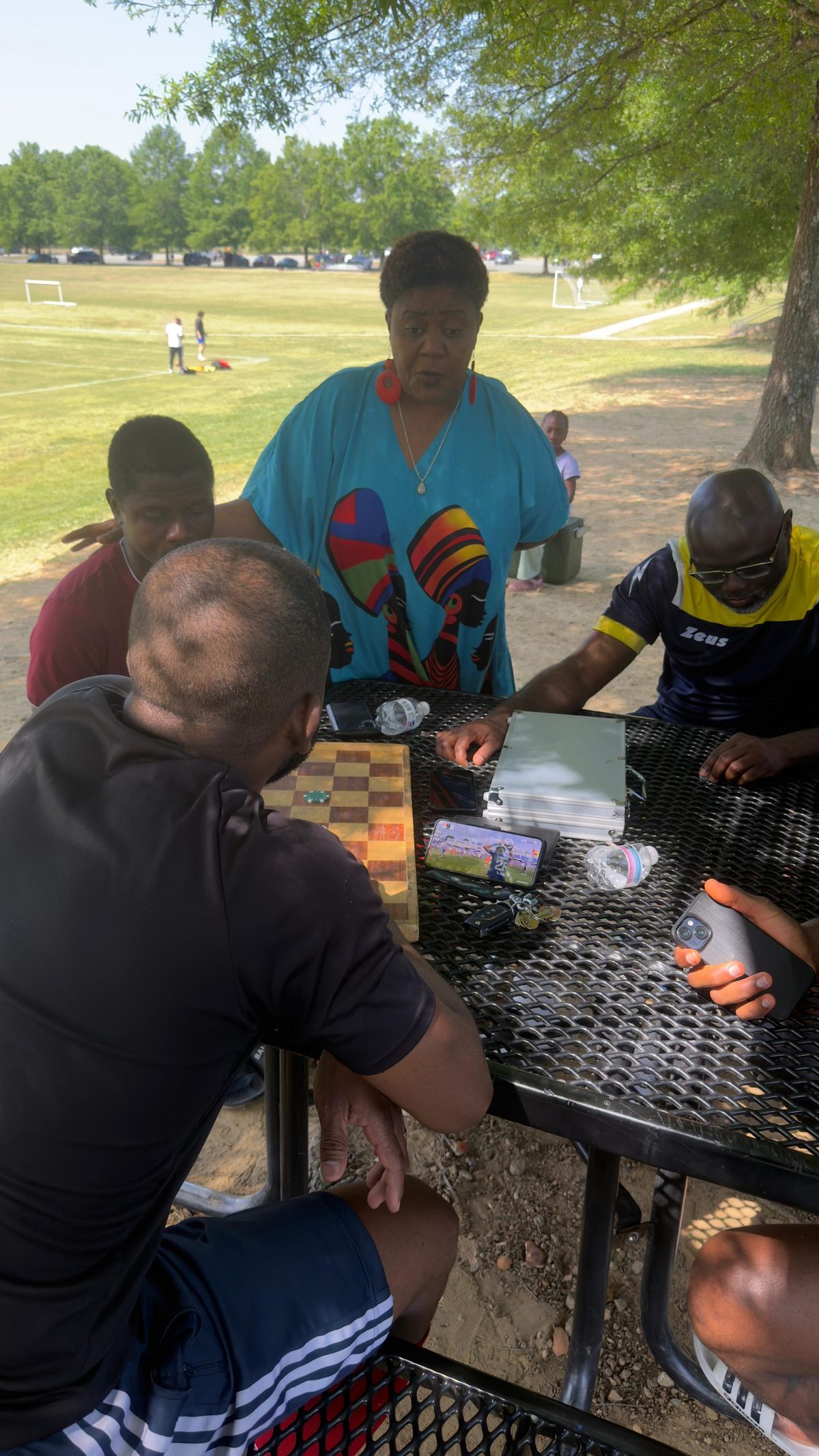 Families gathered for a community day in the park